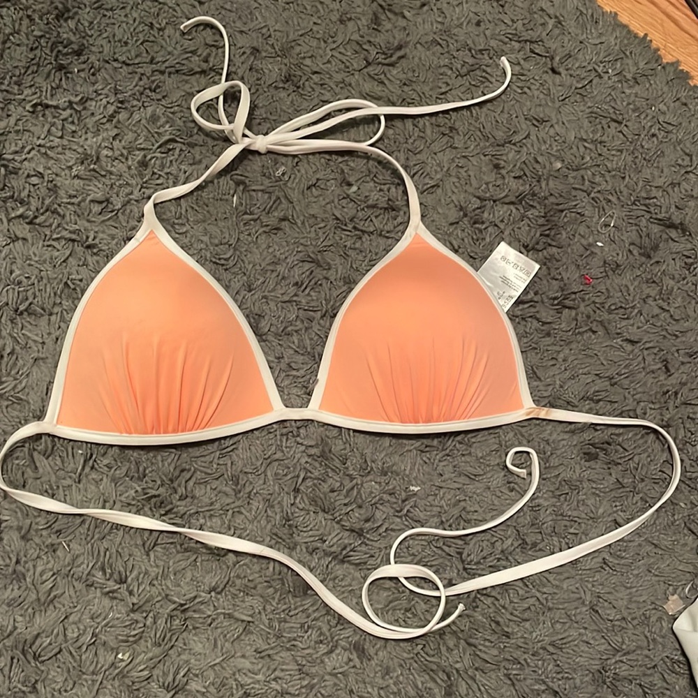 Neon pink and white bathing suit top. One of my favorite tops.